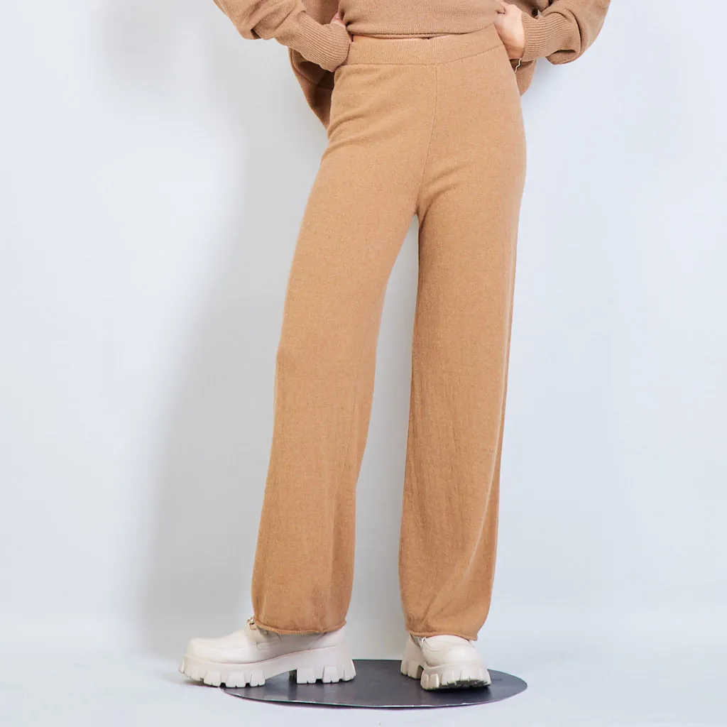 High-waisted wide leg trousers in solid color wholesale